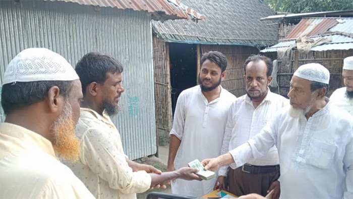 শহীদ পরিবারকে শ্রমিক কল্যাণ ফেডারেশনের আর্থিক সহায়তা প্রদান